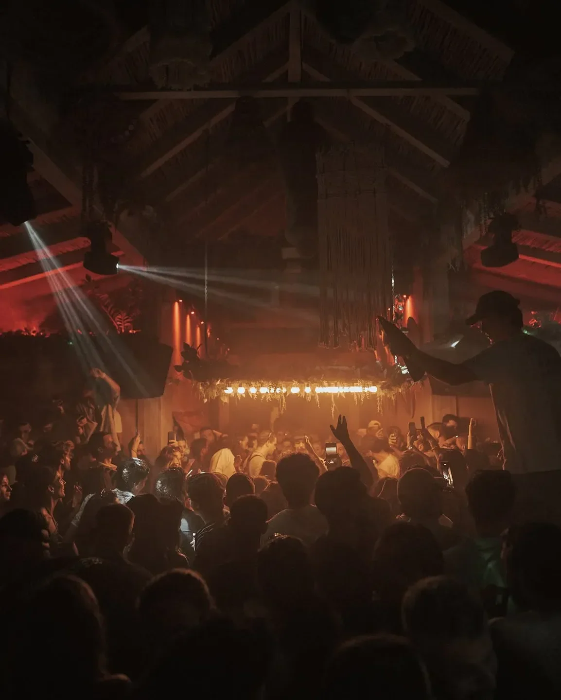 Energetic crowd at Playa Padre Beach Club in Marbella, enjoying the party atmosphere.
