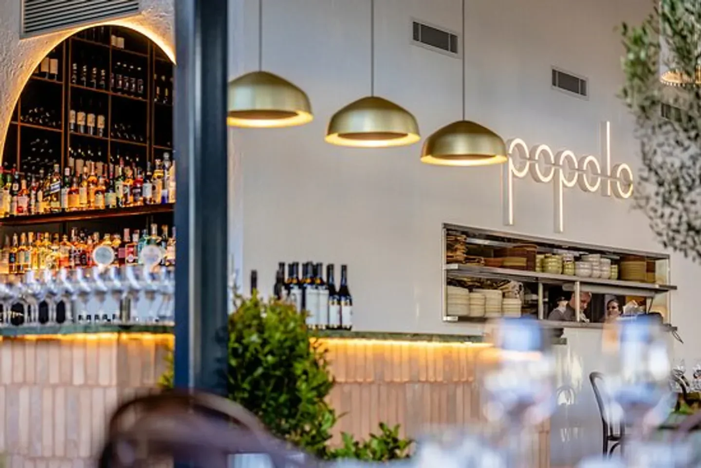 Interior view of POPOLO Brisbane restaurant, featuring stylish design and elegant lighting.