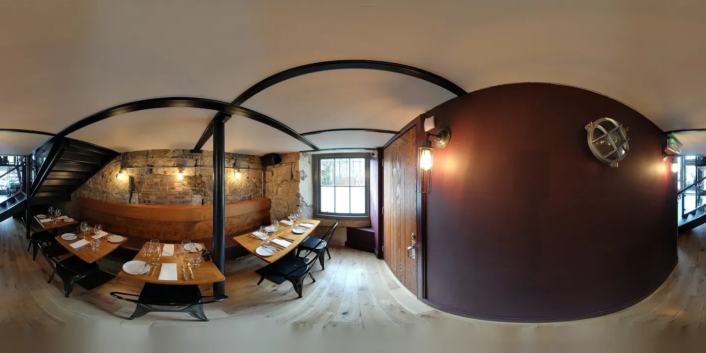 Interior of Porter & Rye restaurant in Glasgow, featuring stylish decor and dining tables