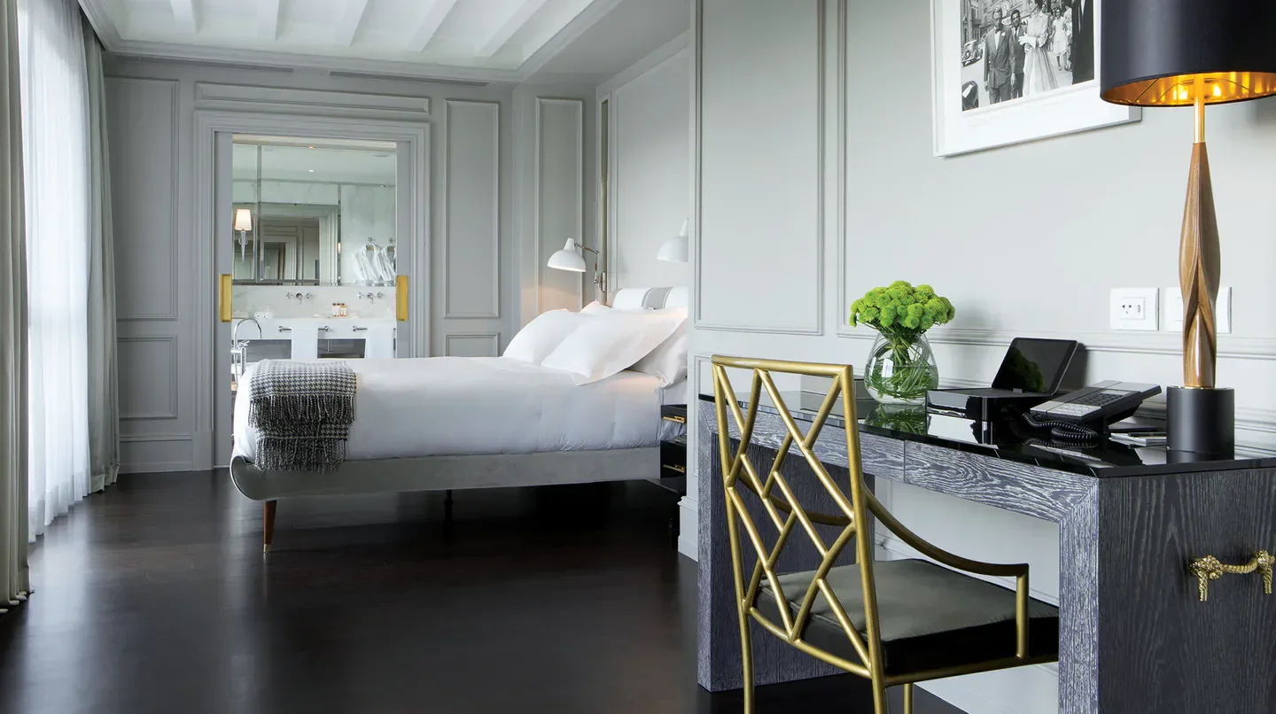 Stylish hotel room at Portrait Firenze - Lungarno Collection in Florence, Italy.