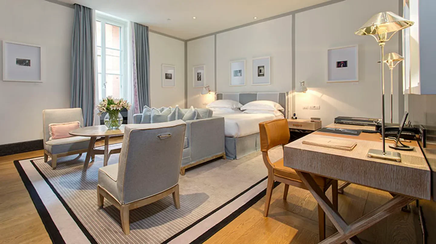 Elegant hotel room at Portrait Roma - Lungarno Collection in Rome, Italy.
