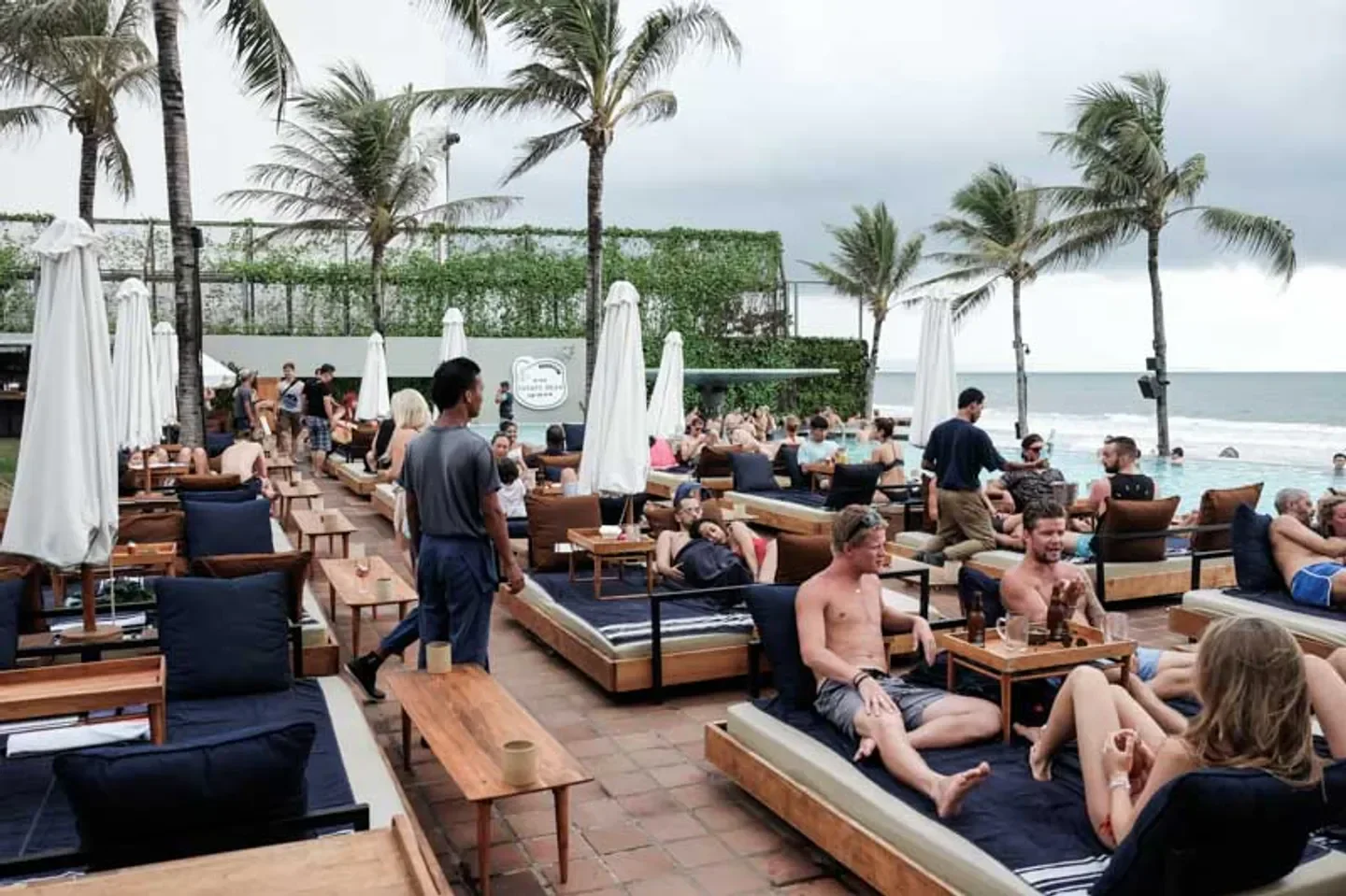 Relaxing day at Potato Head Beach Club in Bali with pool and ocean views