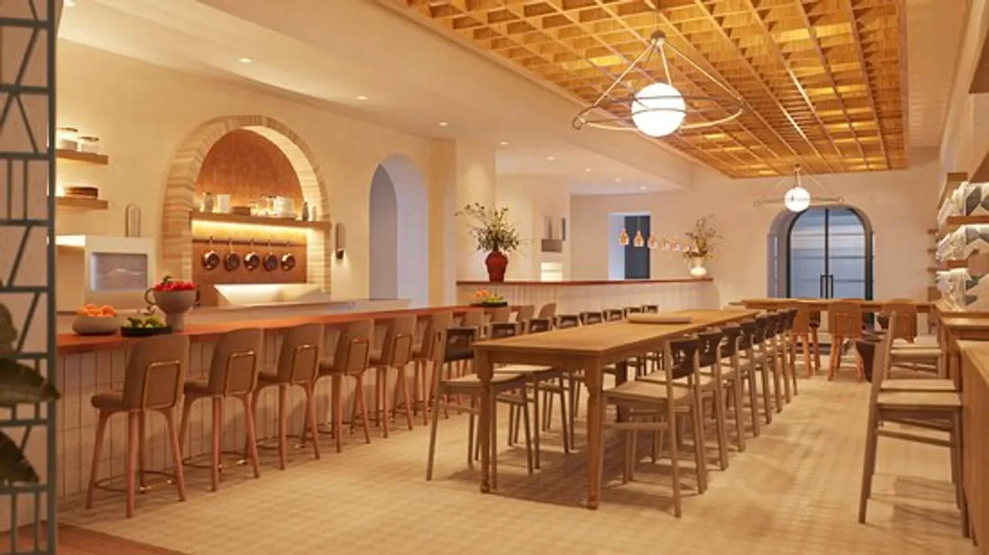 Interior of Primo restaurant in Orlando, with a wooden ceiling and stylish bar seating.