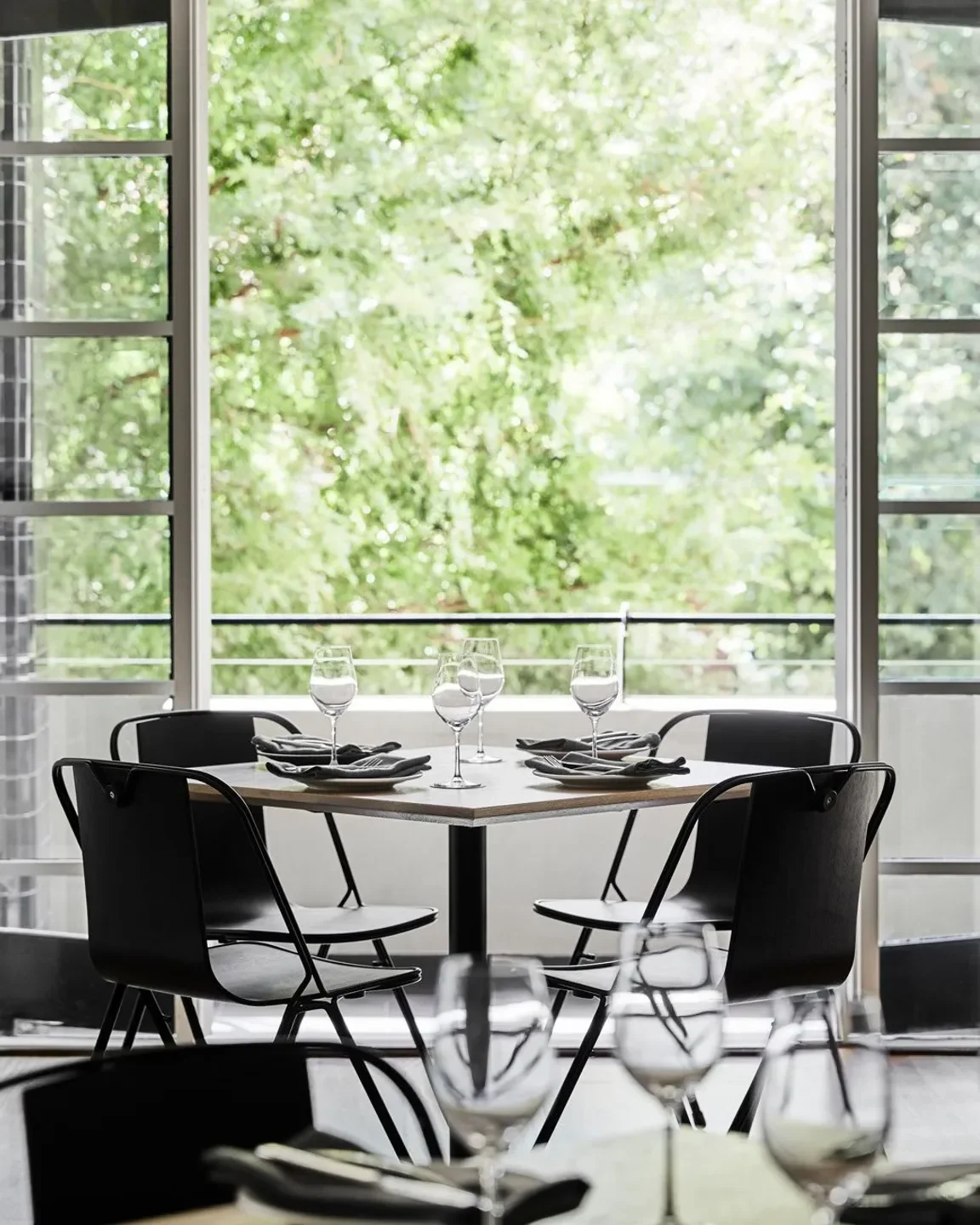 Table setting with open window at Prince Dining Room Melbourne, restaurant interior