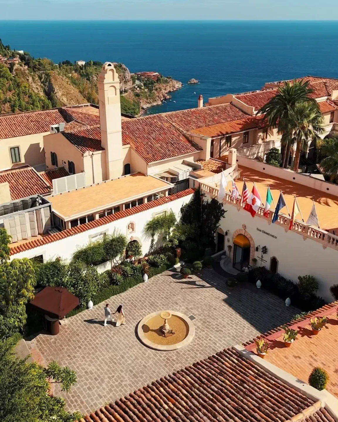 Principe Cerami restaurant exterior courtyard in Sicily with ocean views and Italian architecture