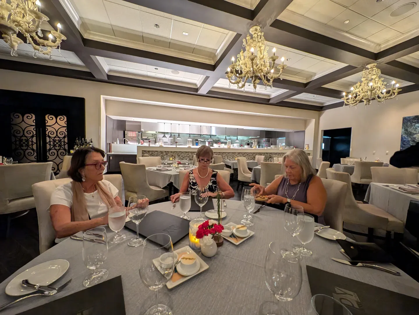 Elegant dining at PY Steakhouse in Tucson, with guests enjoying the restaurant's ambiance.