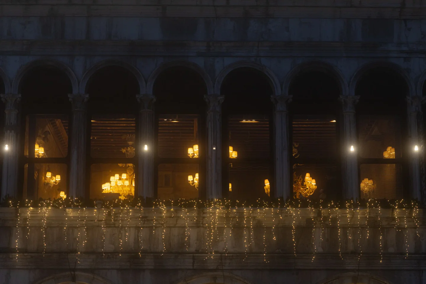 Evening ambiance at Quadri restaurant in Venice, Italy, with warm lighting and elegant architecture.
