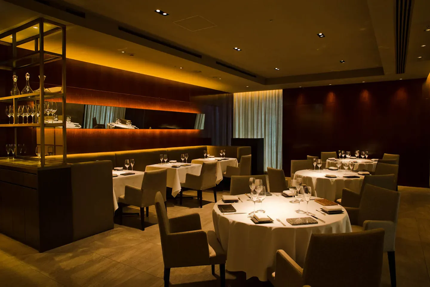 Elegant dining room at Quintessence restaurant in Tokyo, showcasing refined ambiance.