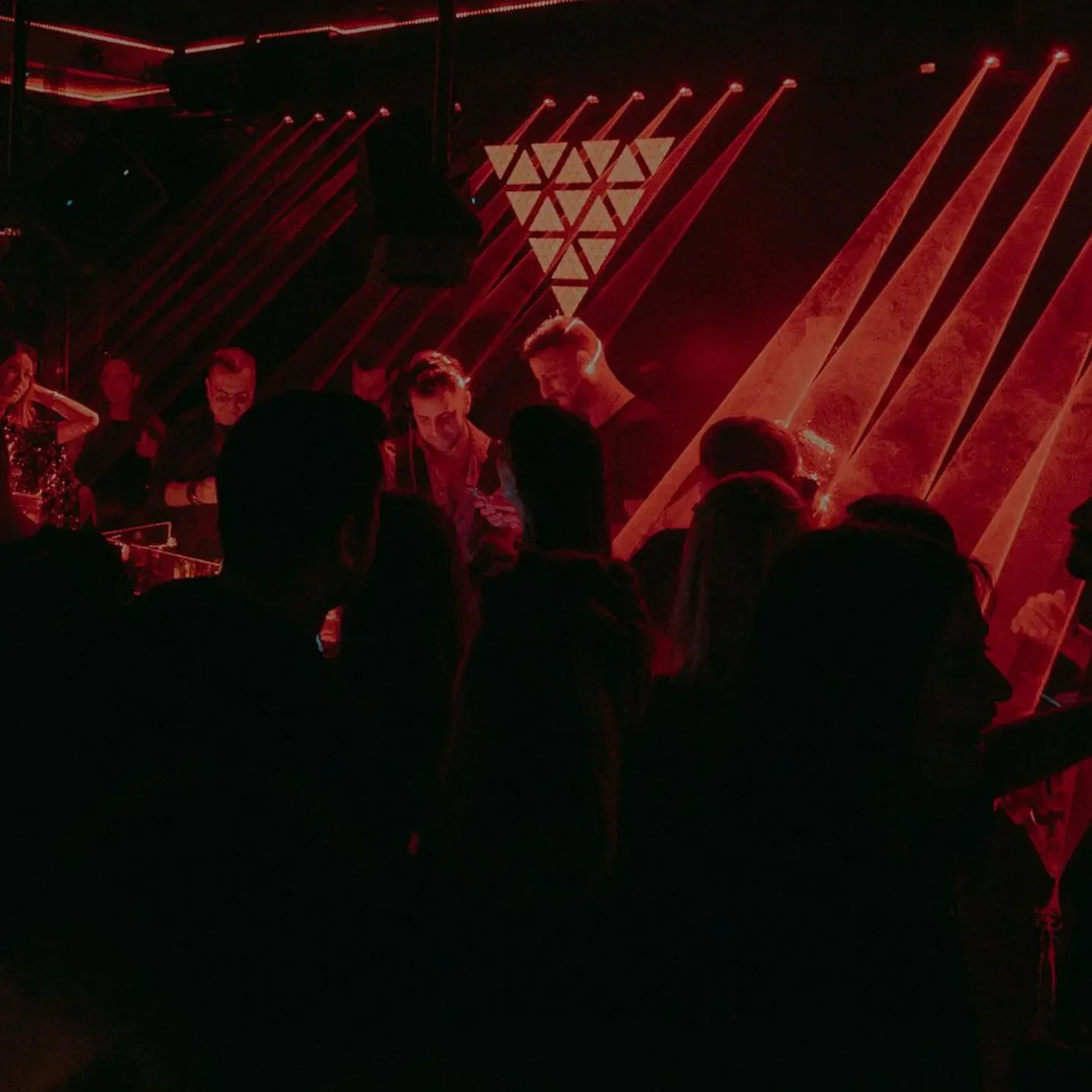 RABBIT nightclub in Tel Aviv with red lights and people dancing