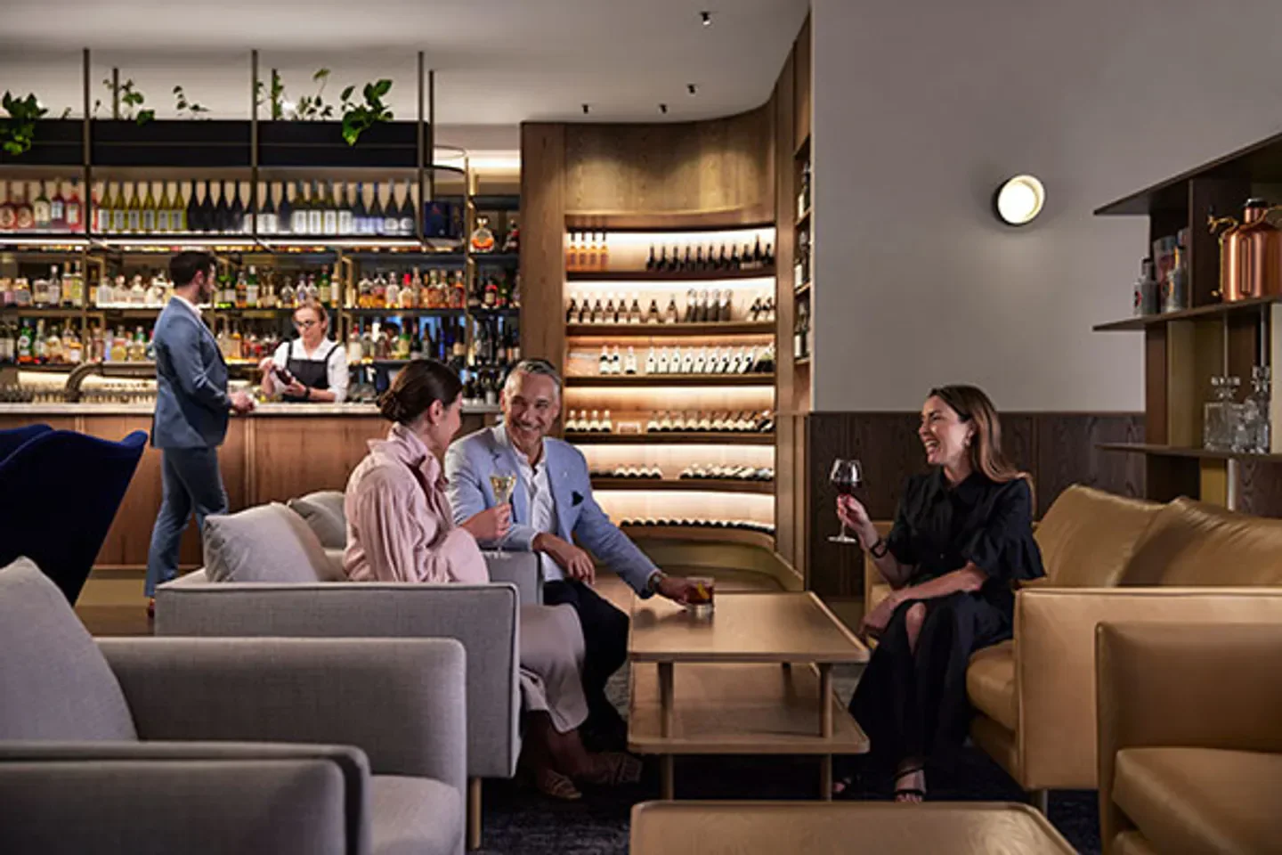 Enjoying drinks at RACV City Club Wine Bar in Melbourne, stylish and inviting ambiance.
