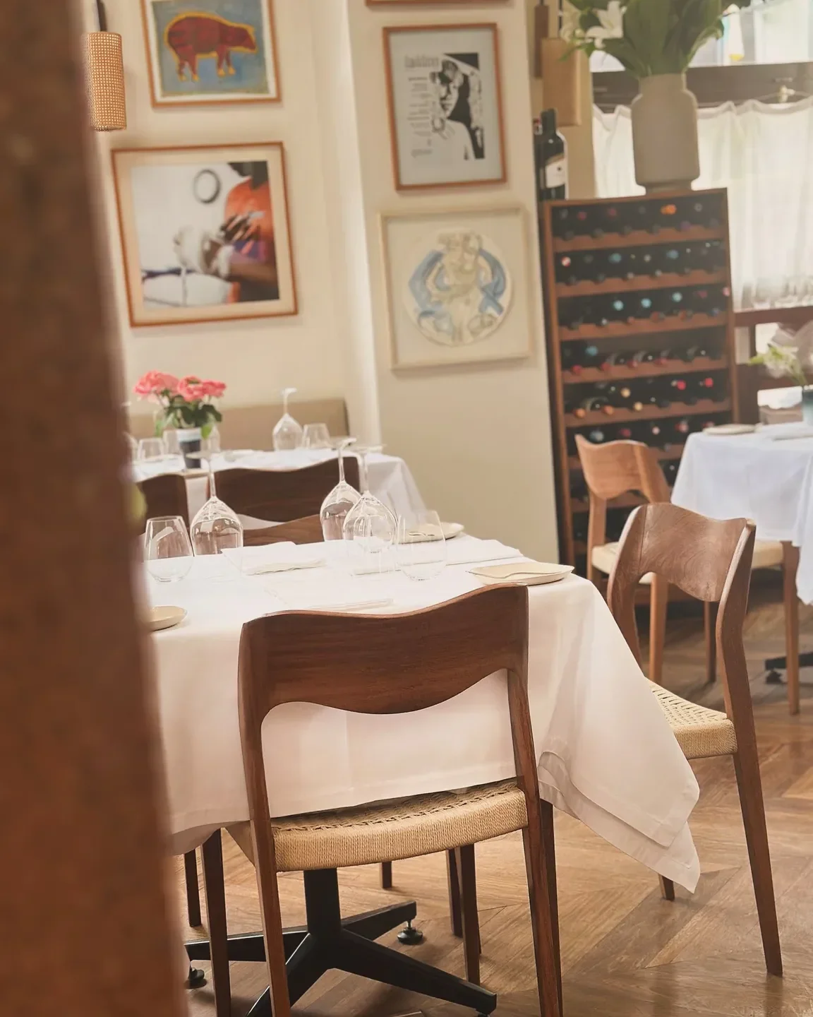 Cozy dining area at Rafael restaurant in Lima, Peru with elegant table settings.