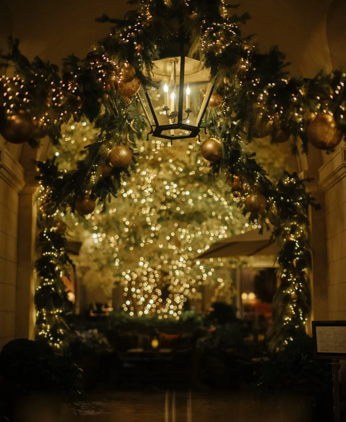 Festive ambiance at Ralph’s in Paris, adorned with holiday lights and decor, creating a warm and inviting atmosphere.
