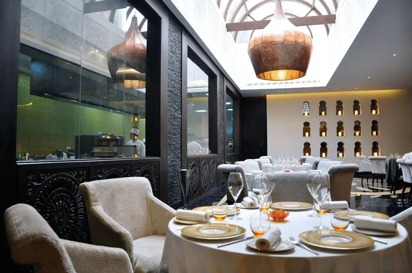Elegant dining at Rasoi by Vineet in Manama, featuring exquisite decor and ambiance.