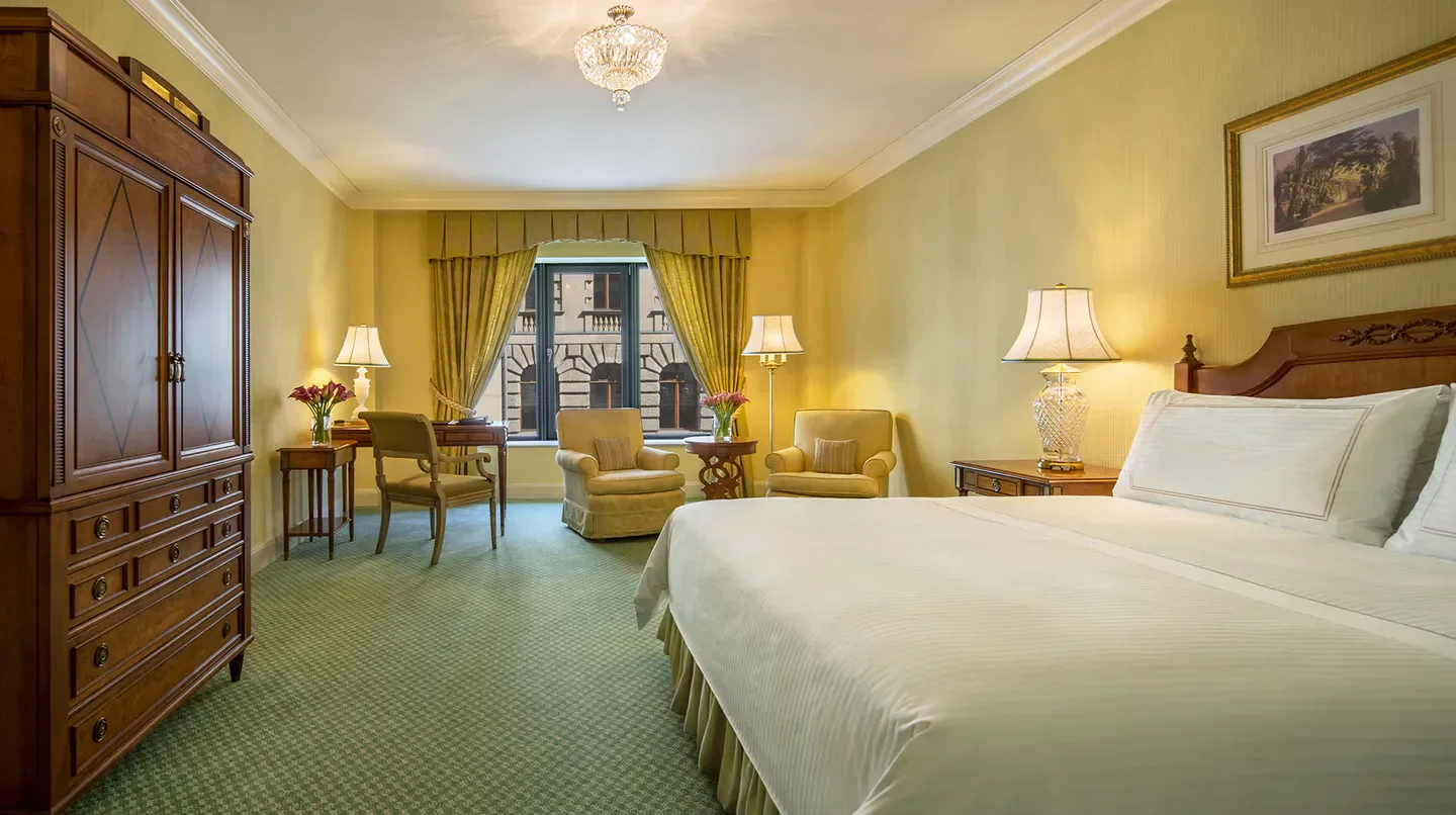 Elegant hotel room at Regent Berlin, featuring a comfortable bed and classic decor in Berlin.
