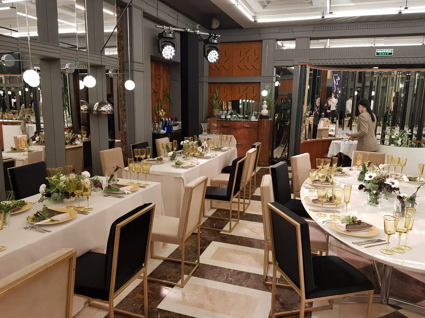 Elegant dining room interior at Regent restaurant in Moscow, featuring prepared tables.