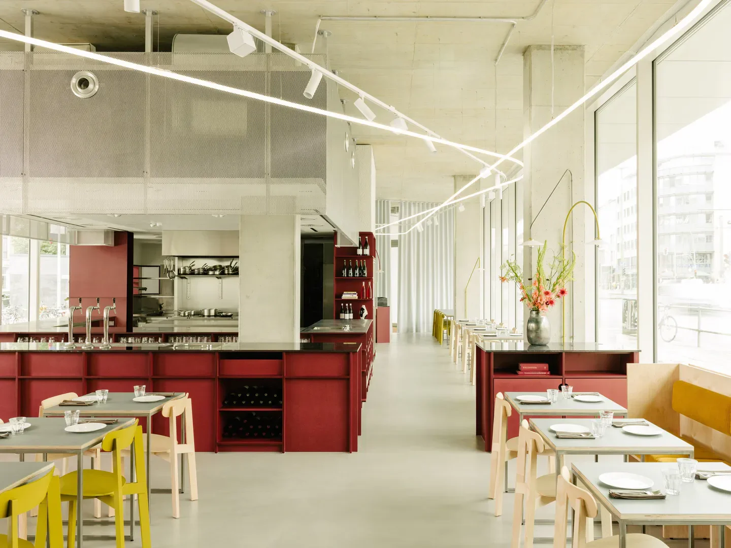 Modern interior of Remi restaurant in Berlin, featuring stylish decor and dining tables.