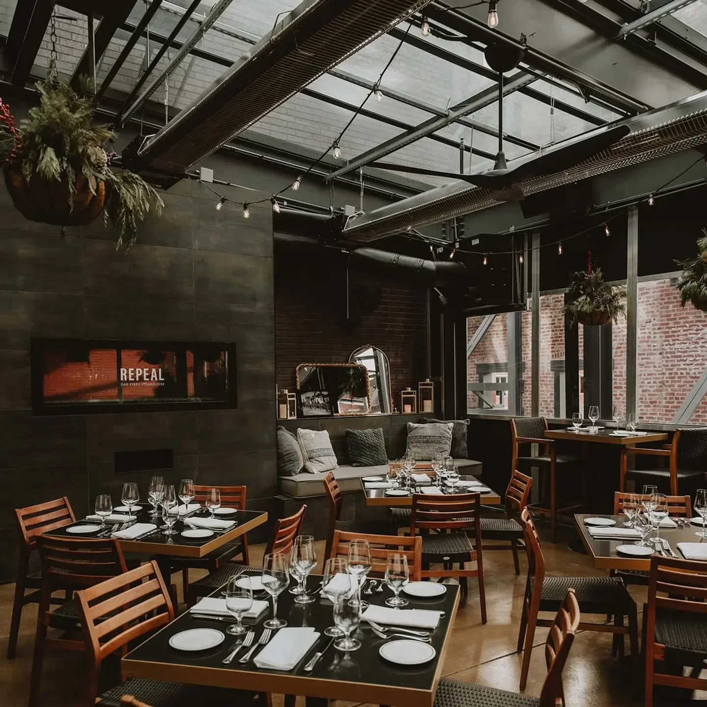 Interior dining area at Repeal Oak Fired Steakhouse in Louisville, Kentucky.