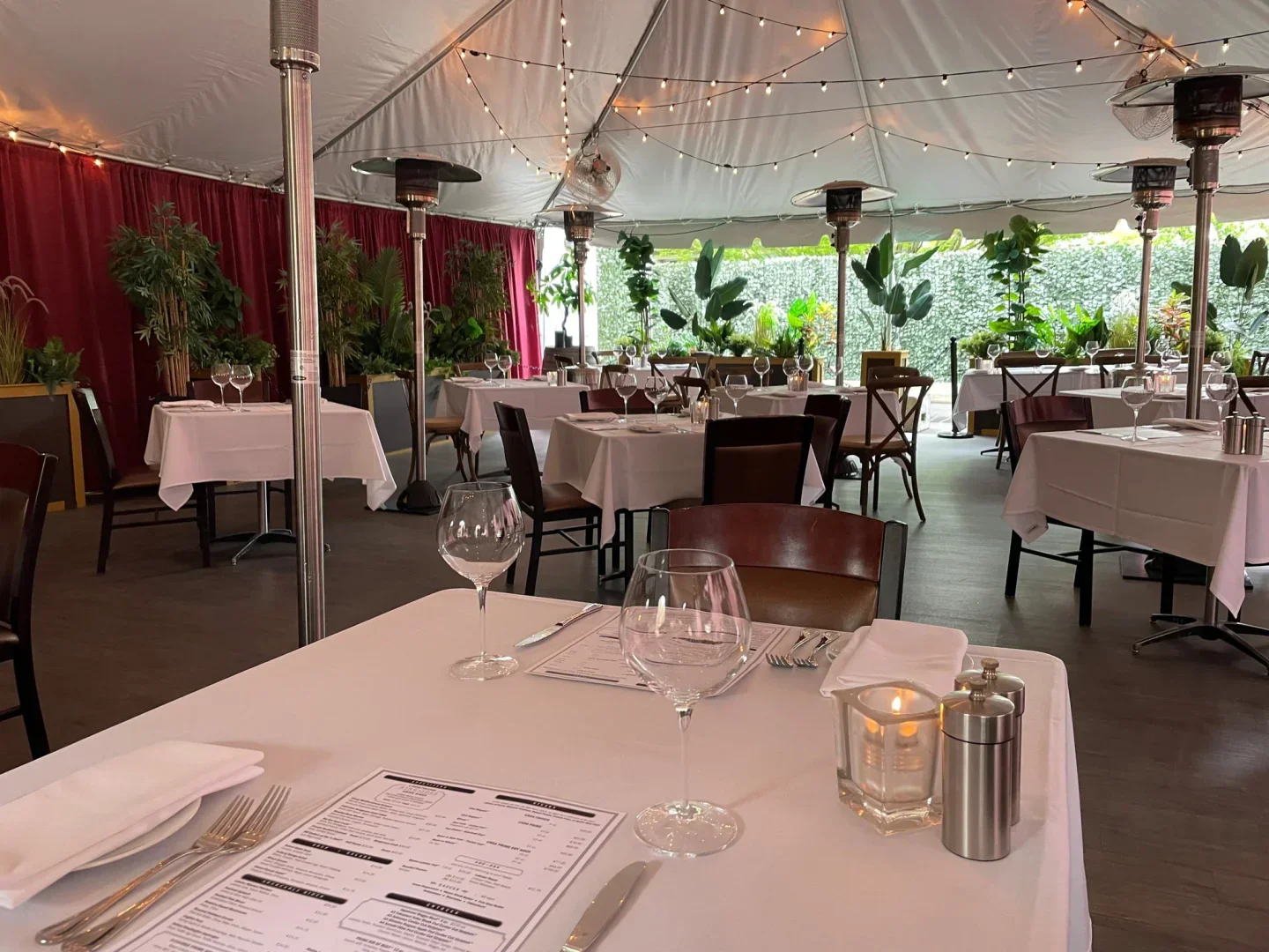 Elegant dining at RingSide Steakhouse in Portland, featuring outdoor seating and ambiance.