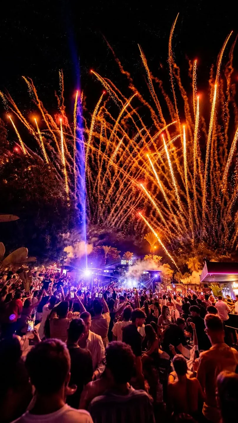 Crowds celebrate under fireworks at Riobo Gallipoli nightclub in Puglia