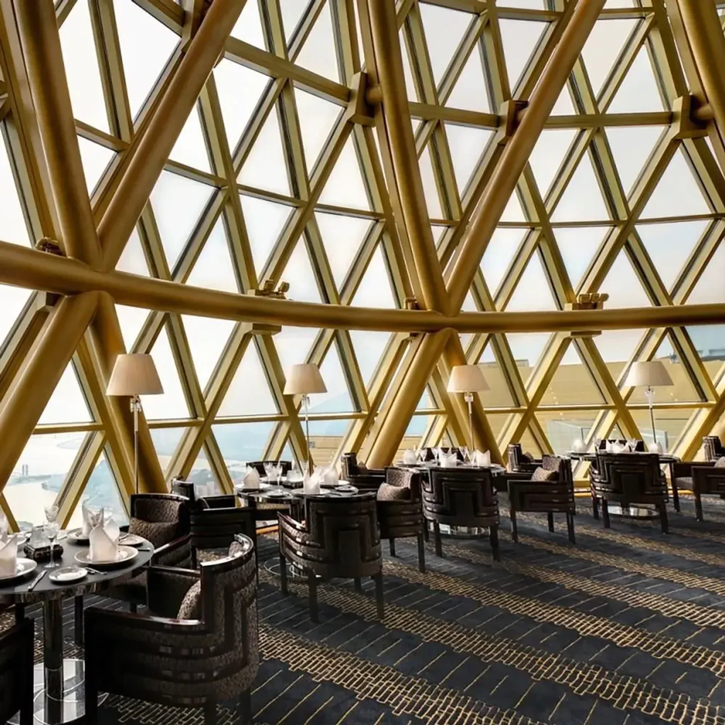 Interior of Robuchon au Dôme in Macau, featuring the unique geometric window structure.