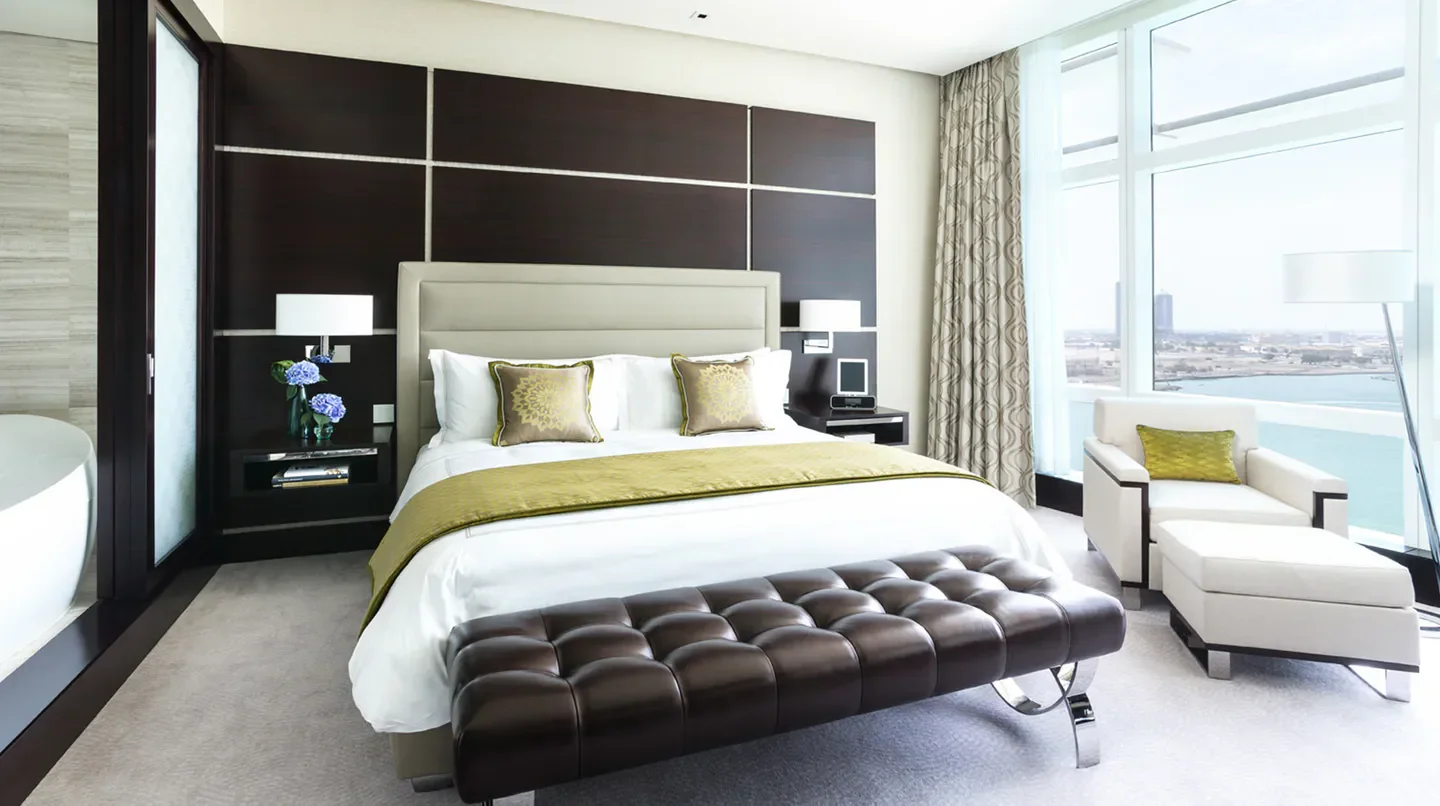 Luxury bedroom at Rosewood Abu Dhabi hotel with city views in Abu Dhabi