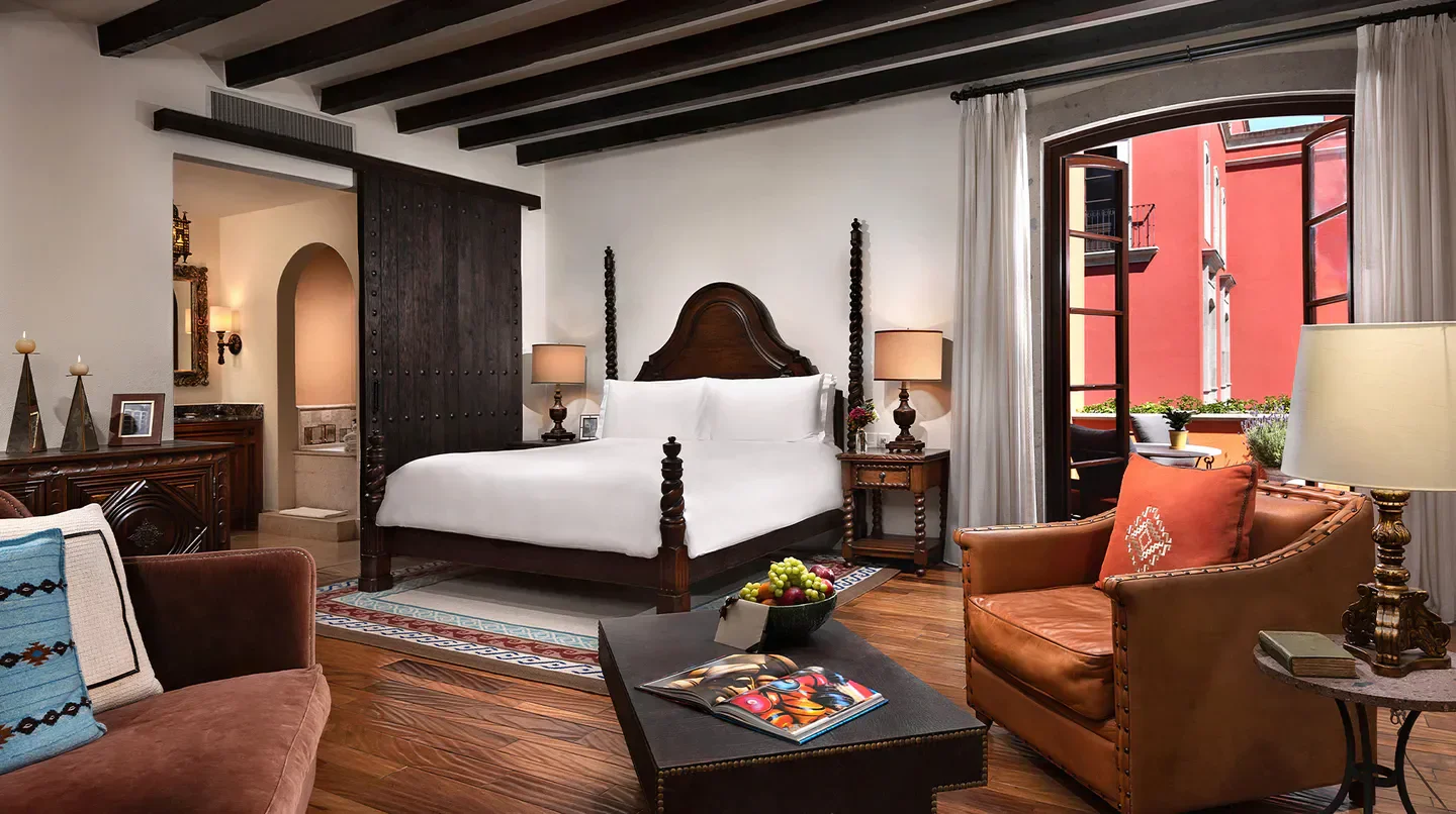 Elegant bedroom at Rosewood San Miguel de Allende, showcasing views of San Miguel