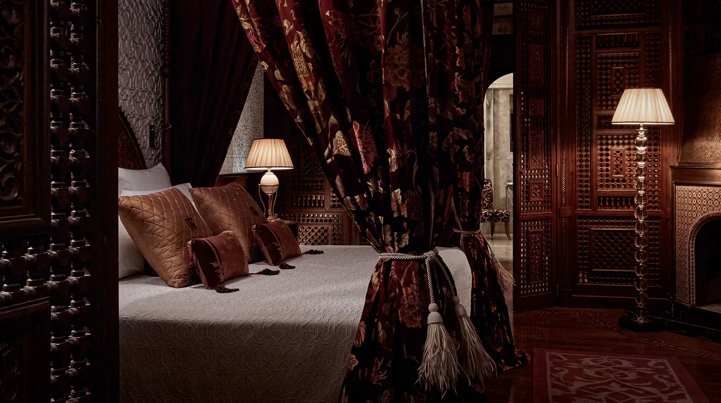 Luxury bedroom at Royal Mansour Marrakech, featuring ornate decor and elegant ambiance in Marrakech