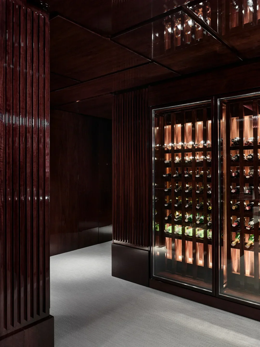 Sankai by Nagaya, Istanbul: Interior wine display with dark wood accents and elegant design.
