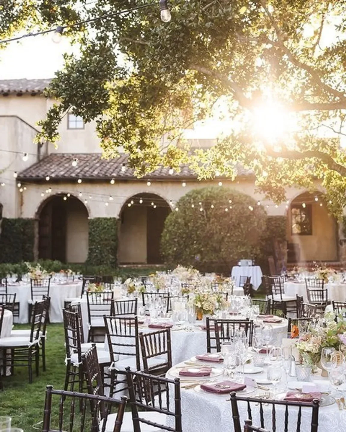 Outdoor dining at Santé in Sonoma with elegant table settings and string lights