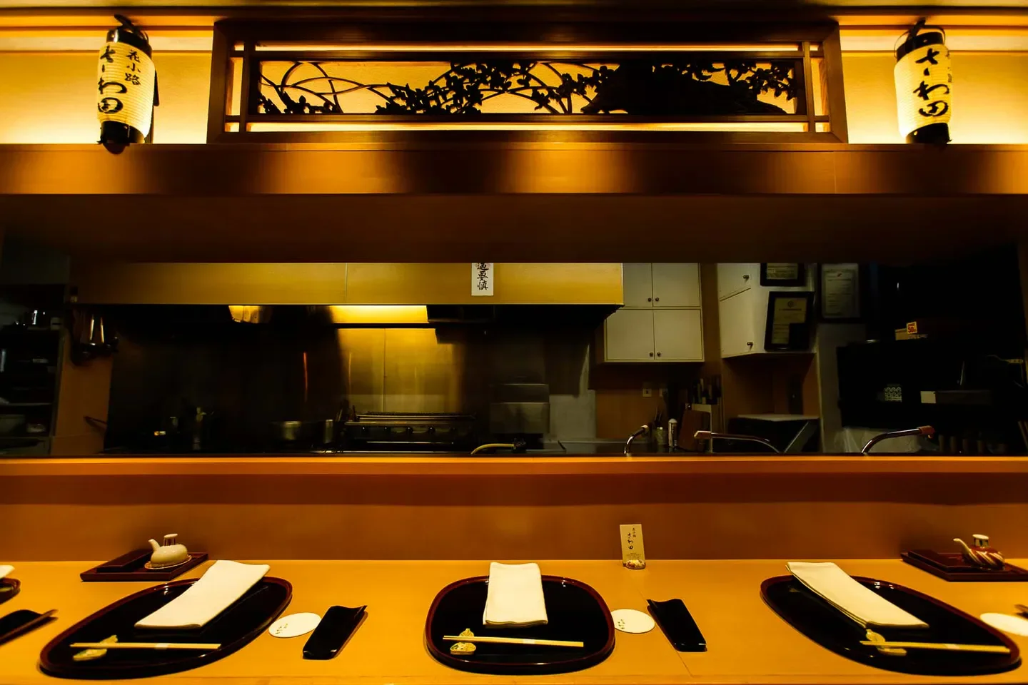 Interior view of Sawada restaurant in Tokyo, showcasing elegant dining setup.