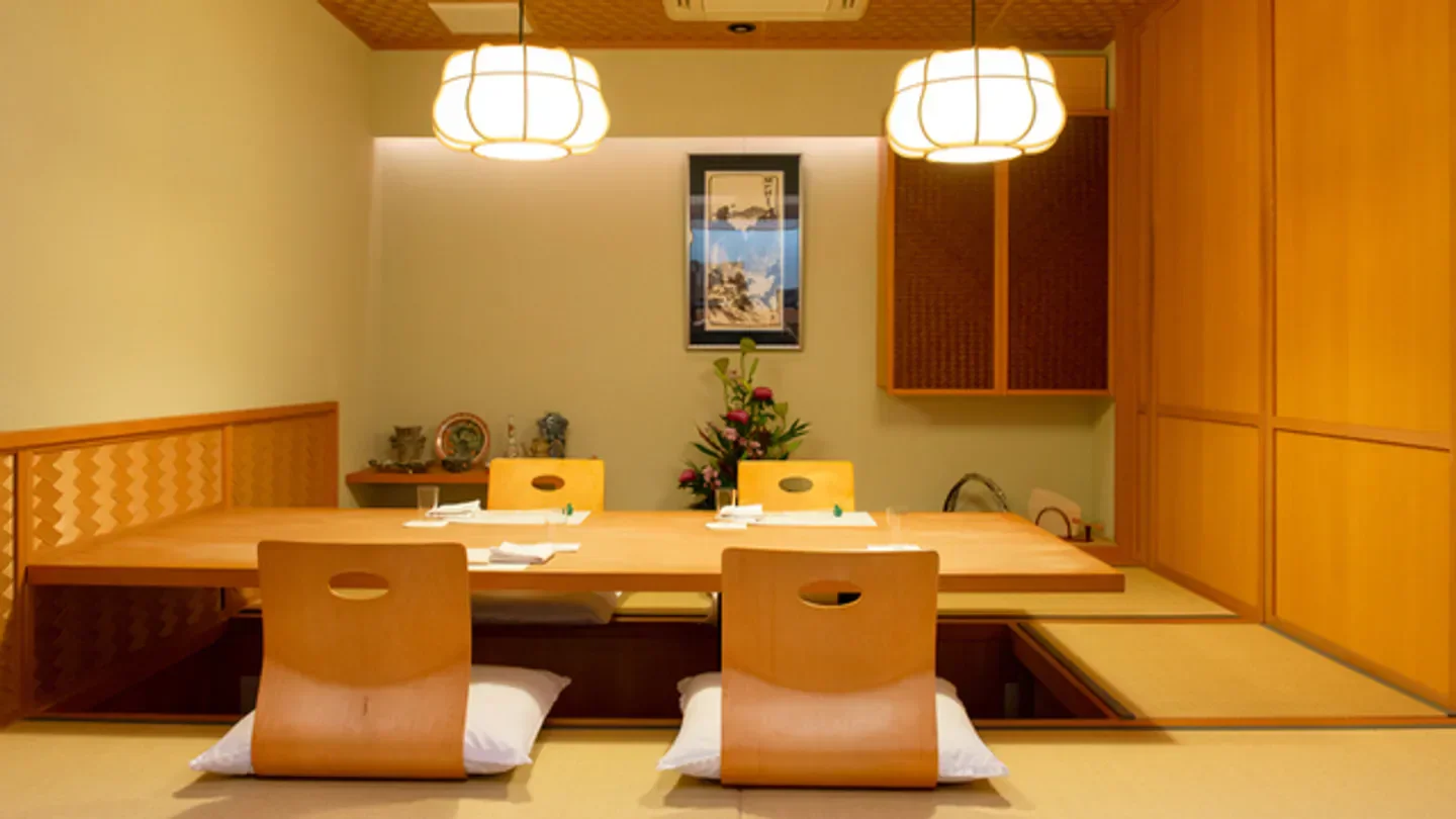 Seika Kobayashi in Tokyo: Traditional Japanese restaurant interior with wooden decor and lanterns