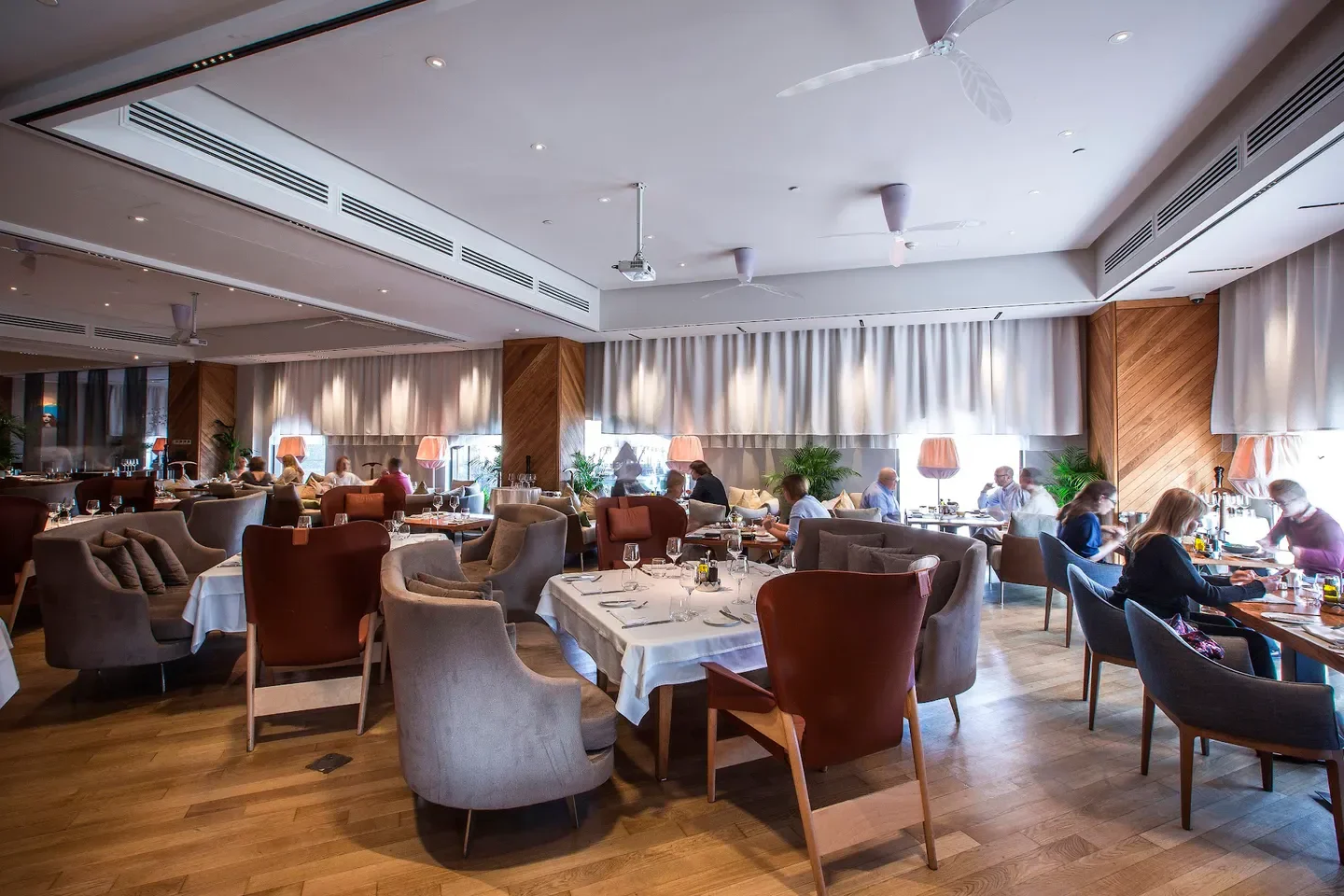 Interior of Selfie Restaurant in Moscow with diners enjoying the elegant atmosphere