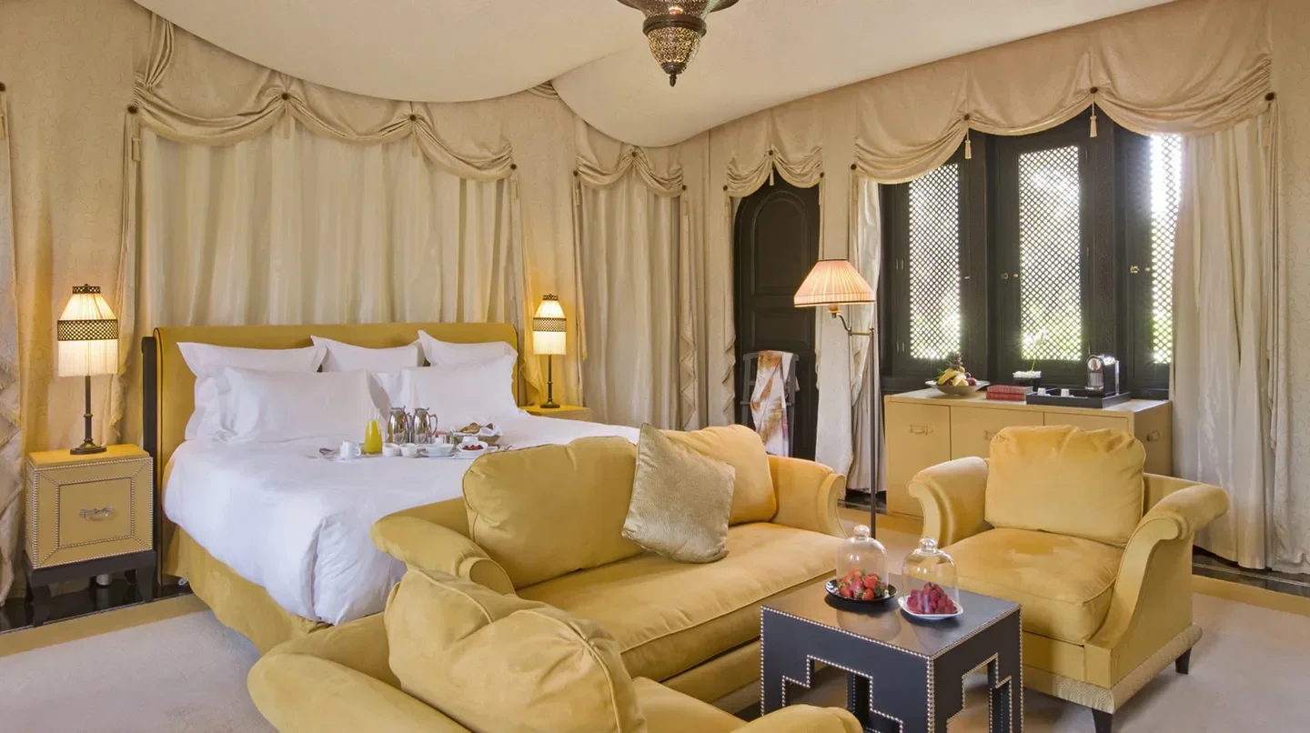 Elegant bedroom at Selman Marrakech hotel with a comfortable sitting area in Marrakech 