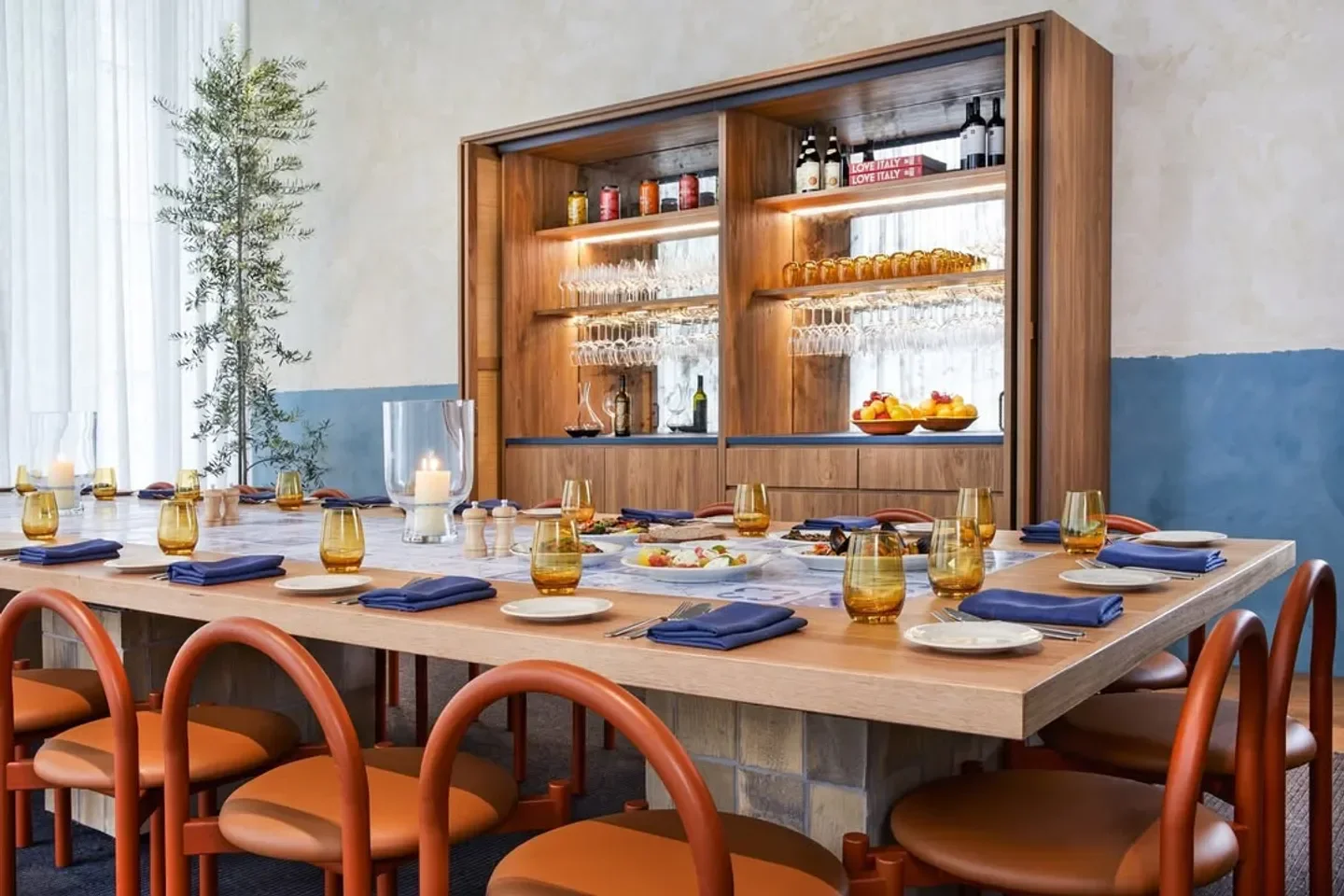 Elegant dining at Settimo Brisbane, featuring a long table and stylish decor.