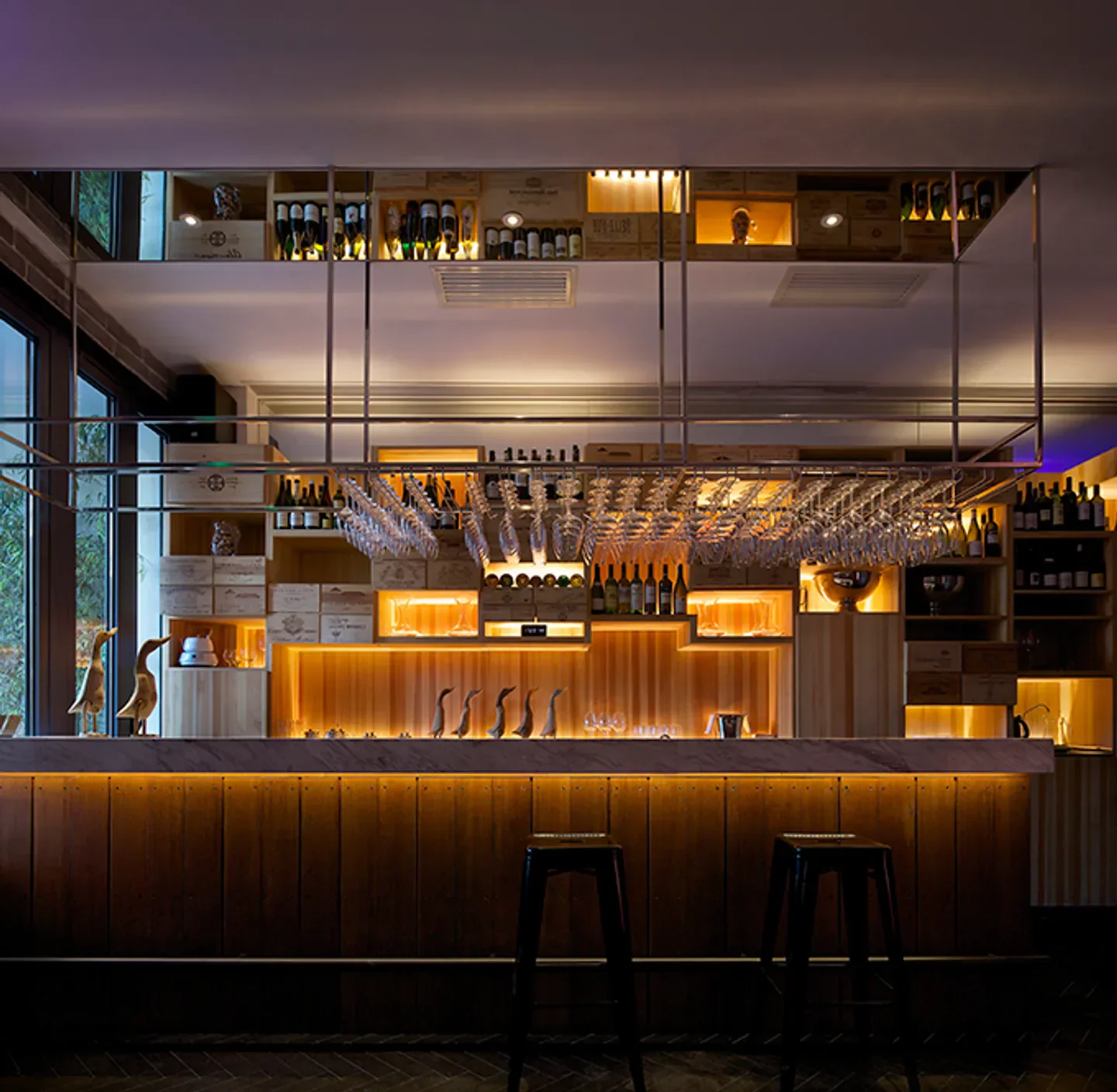 Interior bar at Sheng Yong Xing (Chaoyang) restaurant in Beijing, featuring wine display.