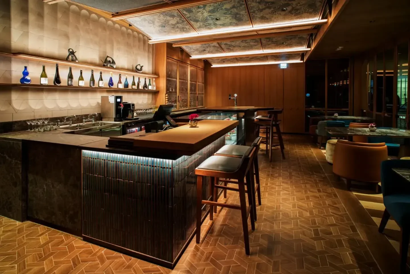 Interior of Shikigiku - IFC restaurant in Hong Kong, with bar and seating area.