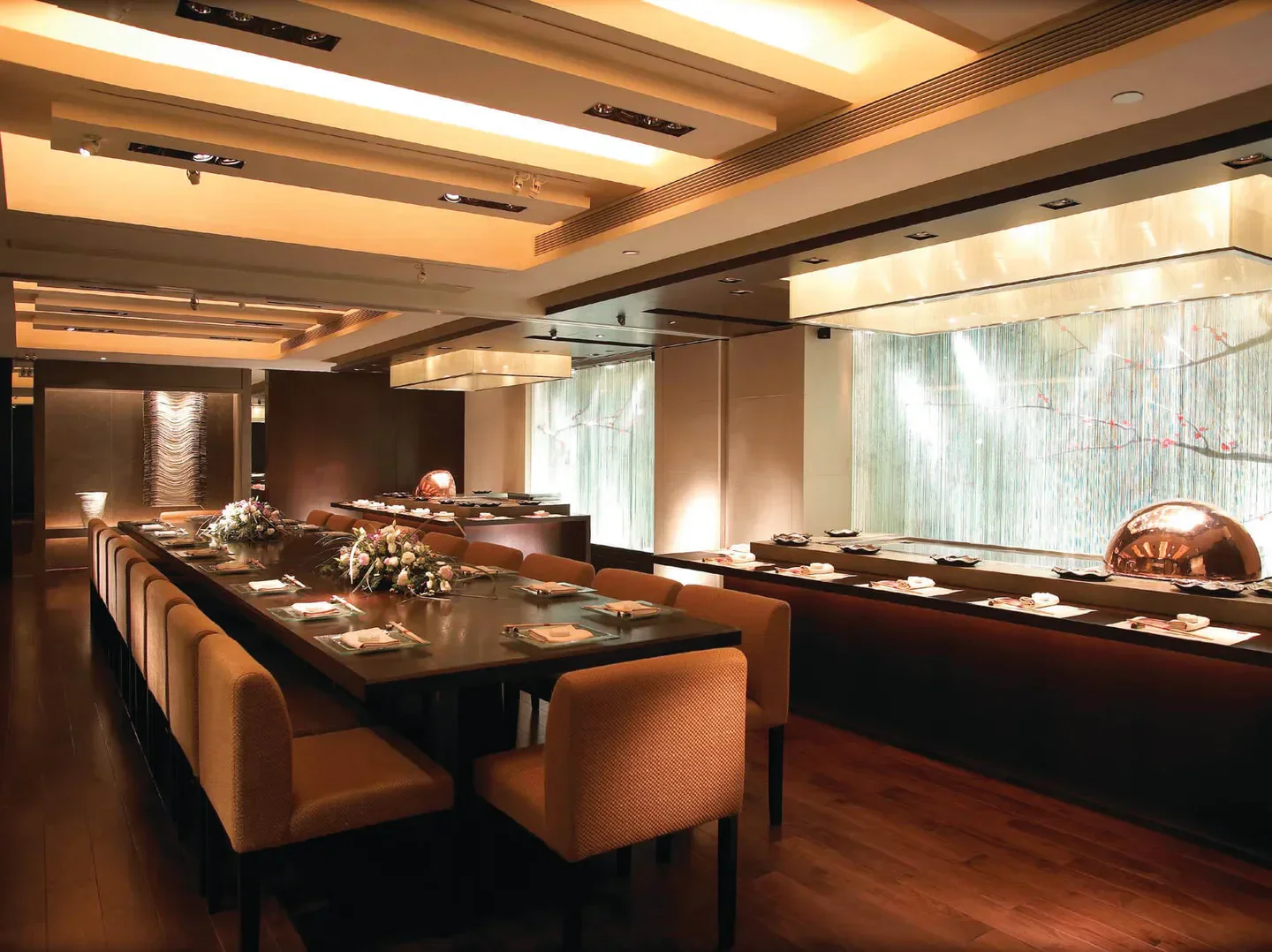 Interior of Shikigiku Japanese Restaurant at The Royal Garden in Hong Kong with elegant decor.