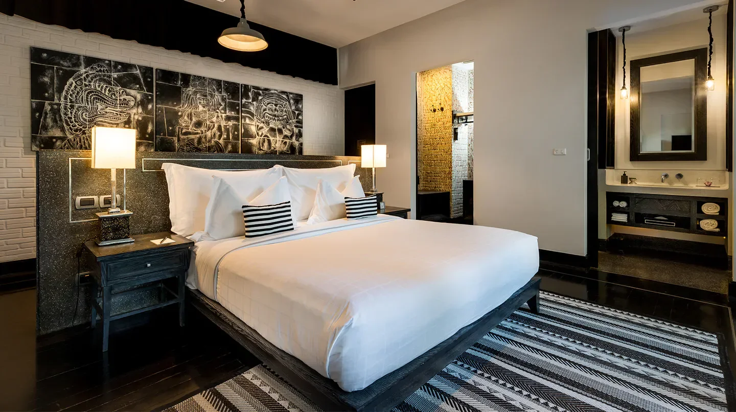 Stylish bedroom at Shinta Mani Angkor and Bensley Collection Pool Villas in Siem Reap.