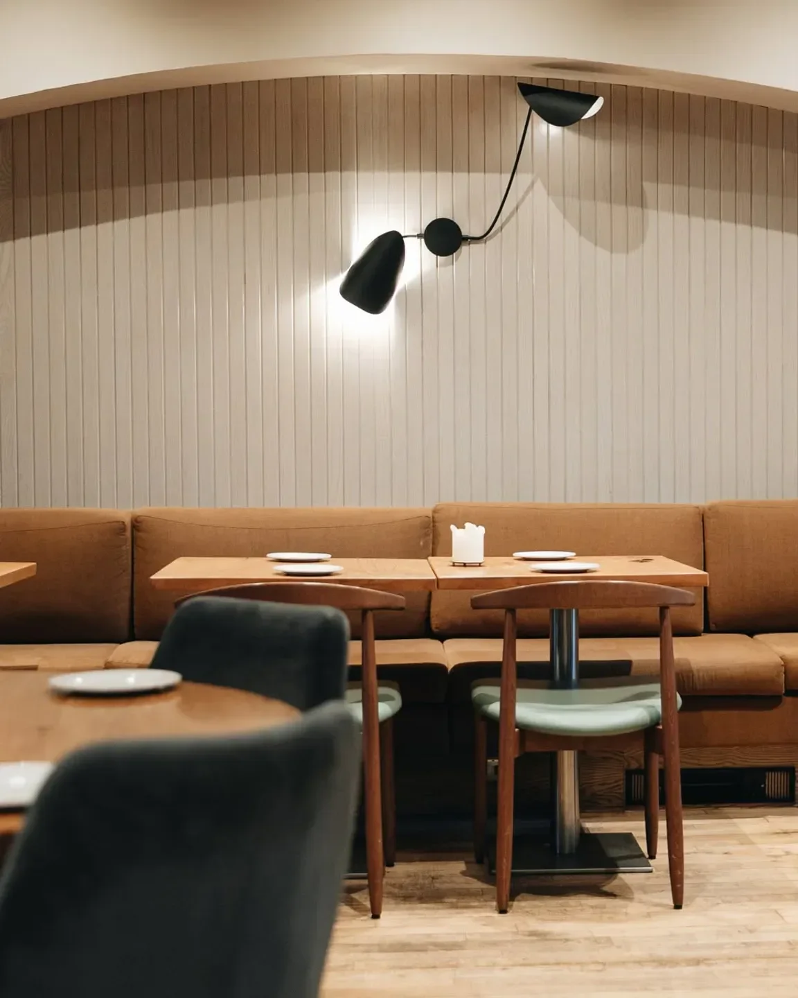 Cozy dining area at Shucks Glasgow restaurant in Glasgow with stylish decor and lighting.