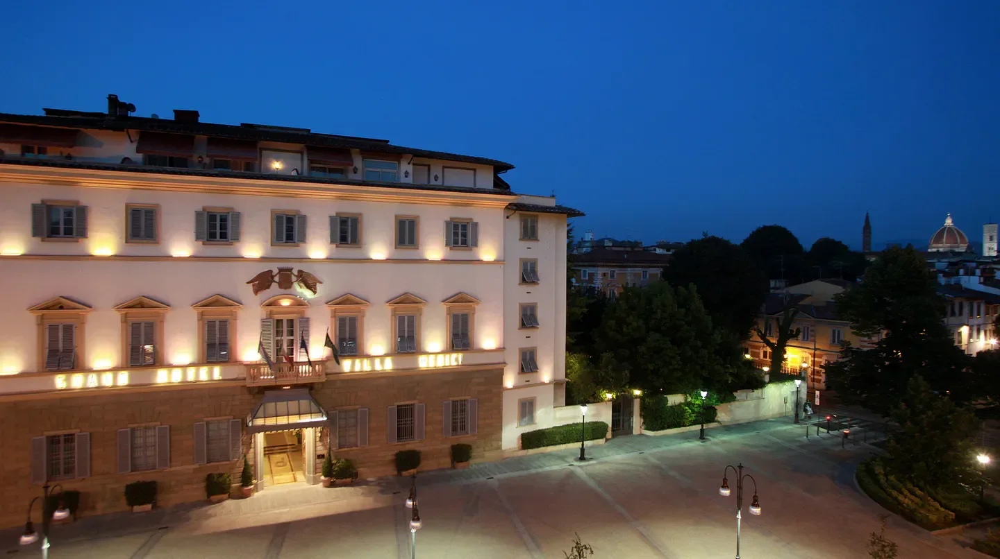 Sina Villa Medici, Autograph Collection in Florence at dusk, elegant hotel facade.