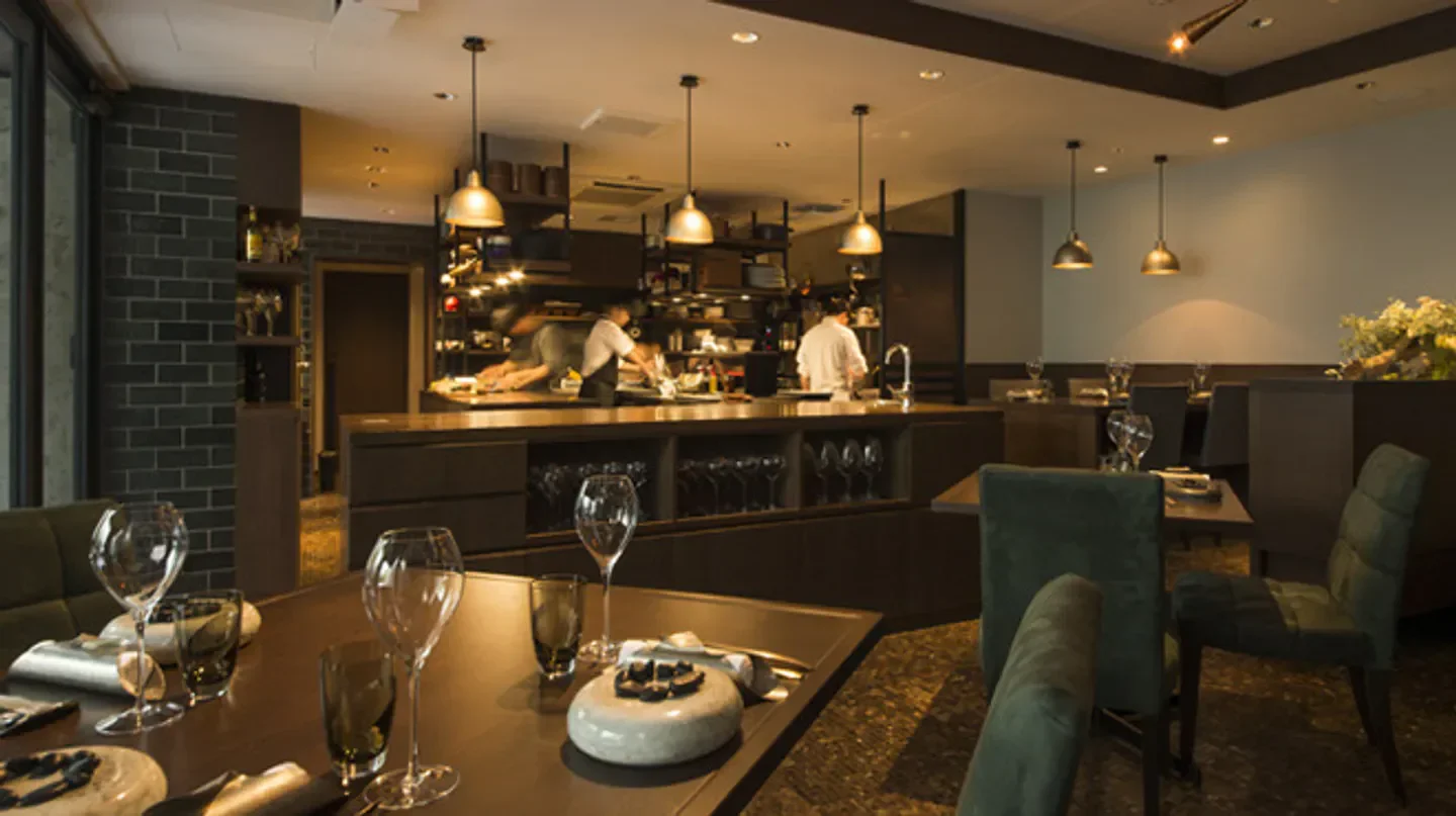 Interior dining view at Sincère restaurant in Tokyo, showcasing elegant setting and ambiance.