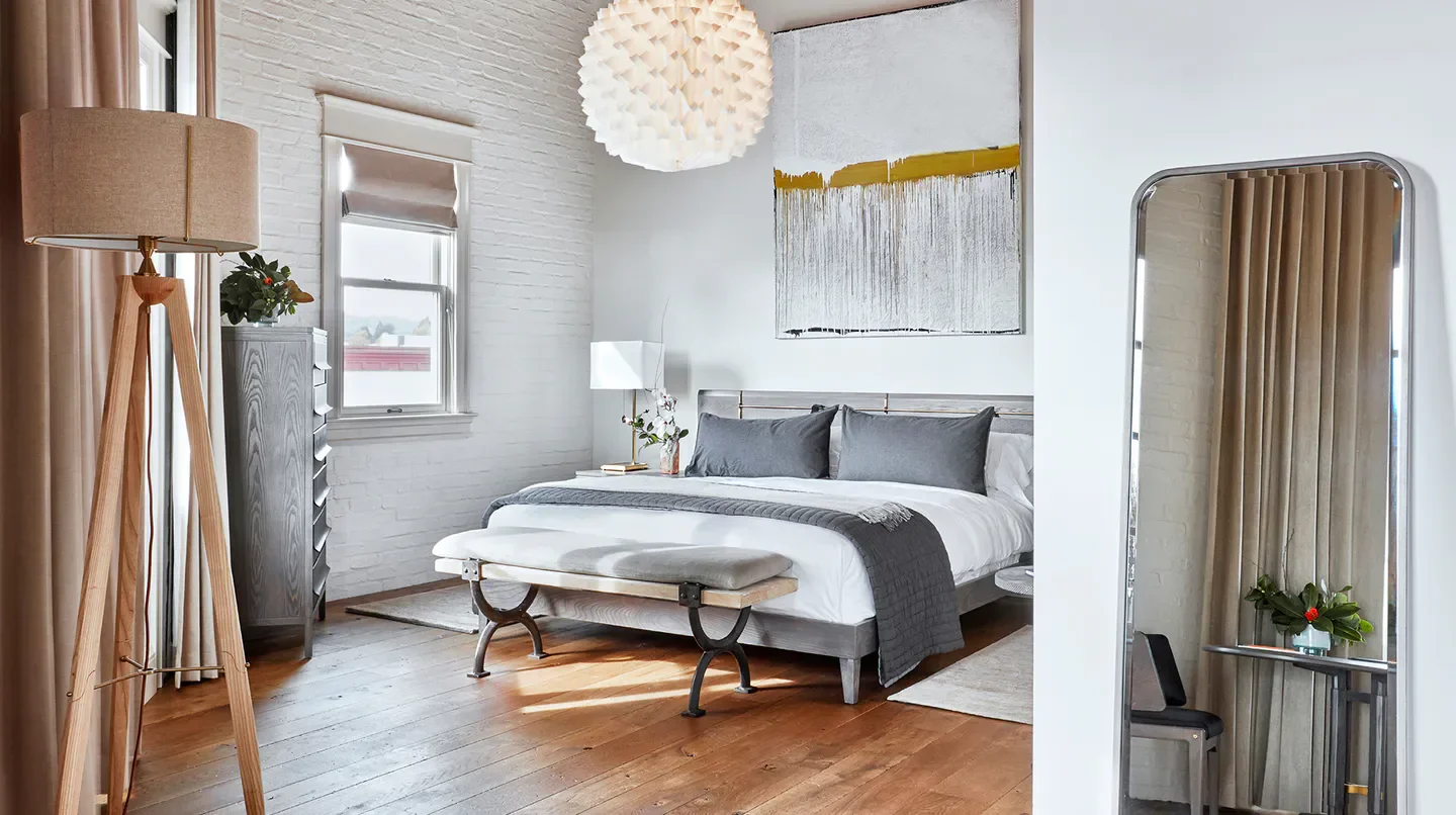 Cozy bedroom at SingleThread Farms hotel in Sonoma, featuring stylish decor and design