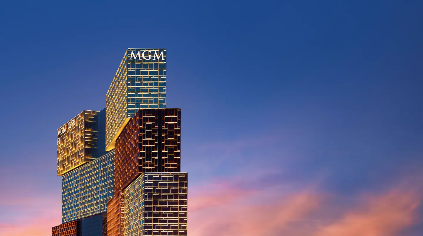 Skylofts at MGM COTAI hotel in Macau, modern architecture against sunset sky.