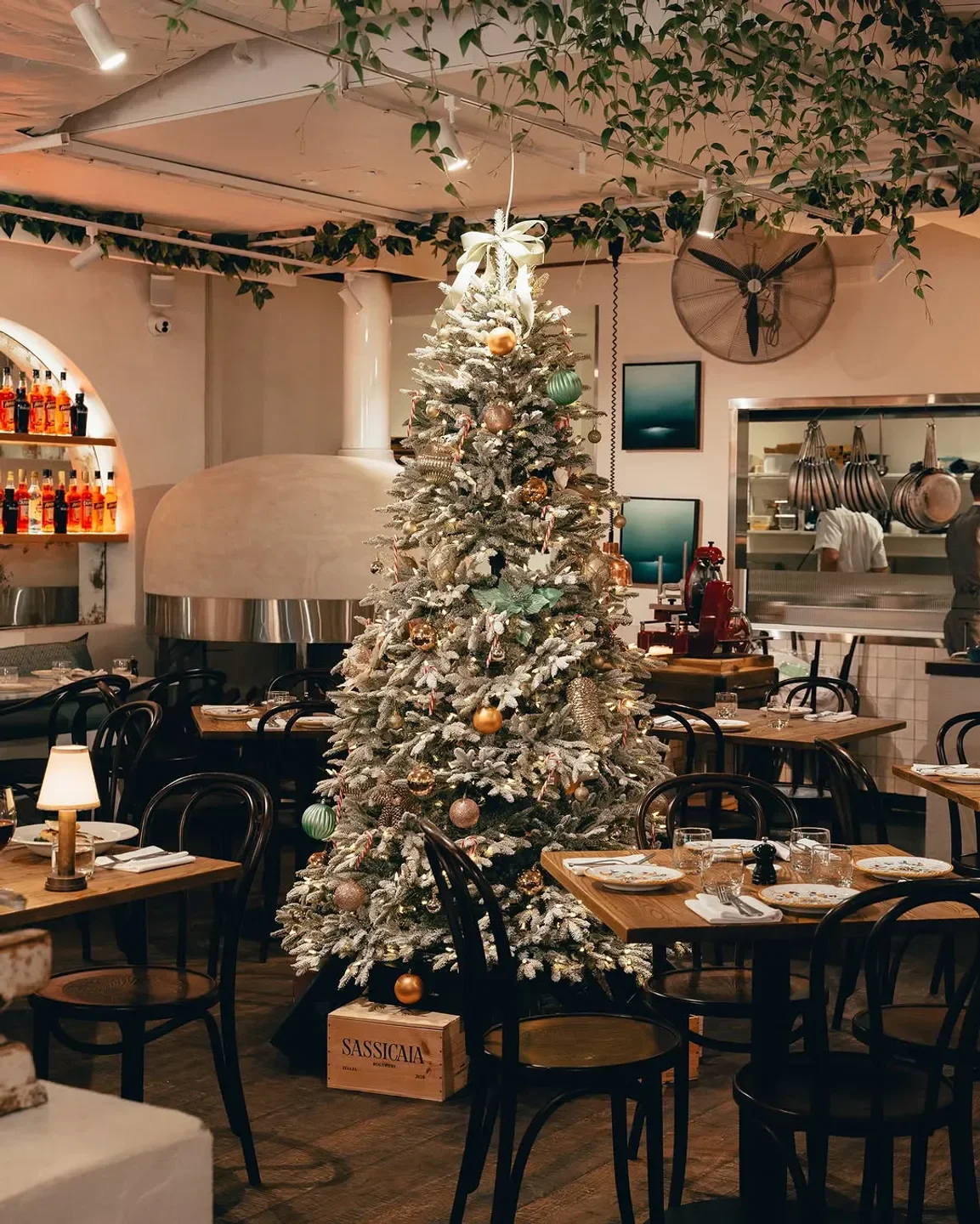 Festive interior at Sofia's Gold Coast restaurant with a decorated Christmas tree.