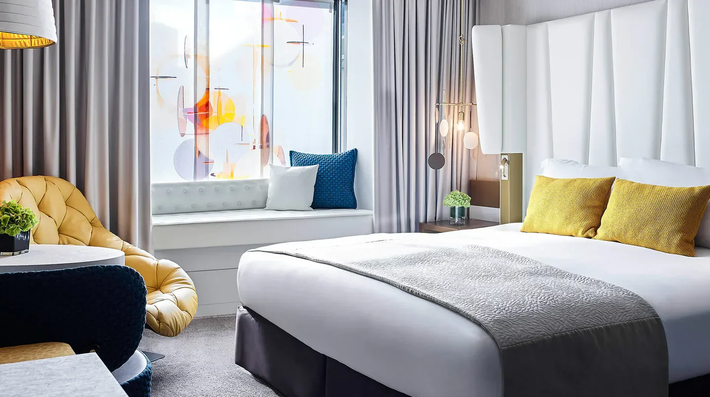 Stylish hotel room at Sofitel Munich Bayerpost, offering luxurious stay in Munich.