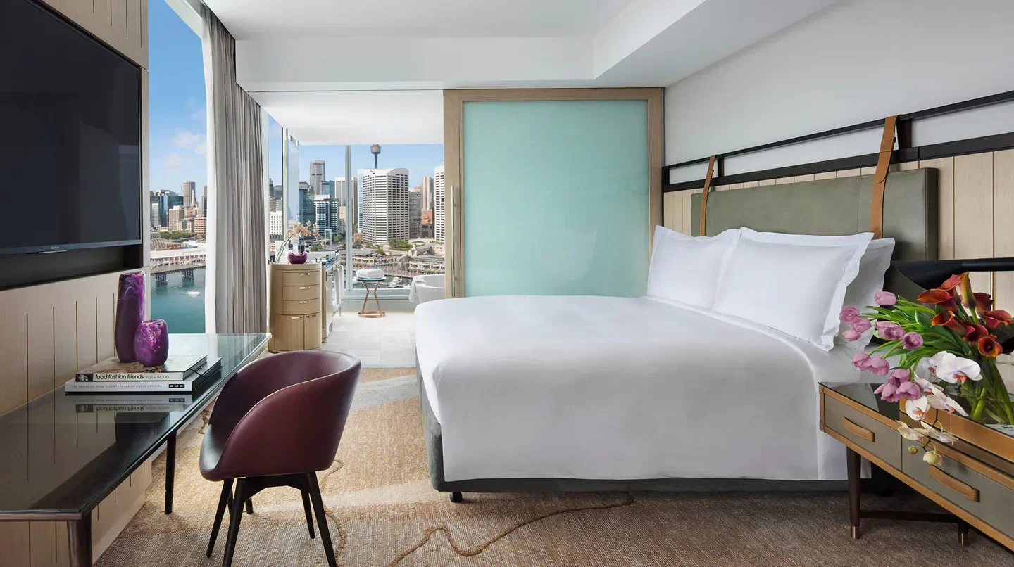 Luxury room with Sydney skyline views at Sofitel Sydney Darling Harbour hotel.