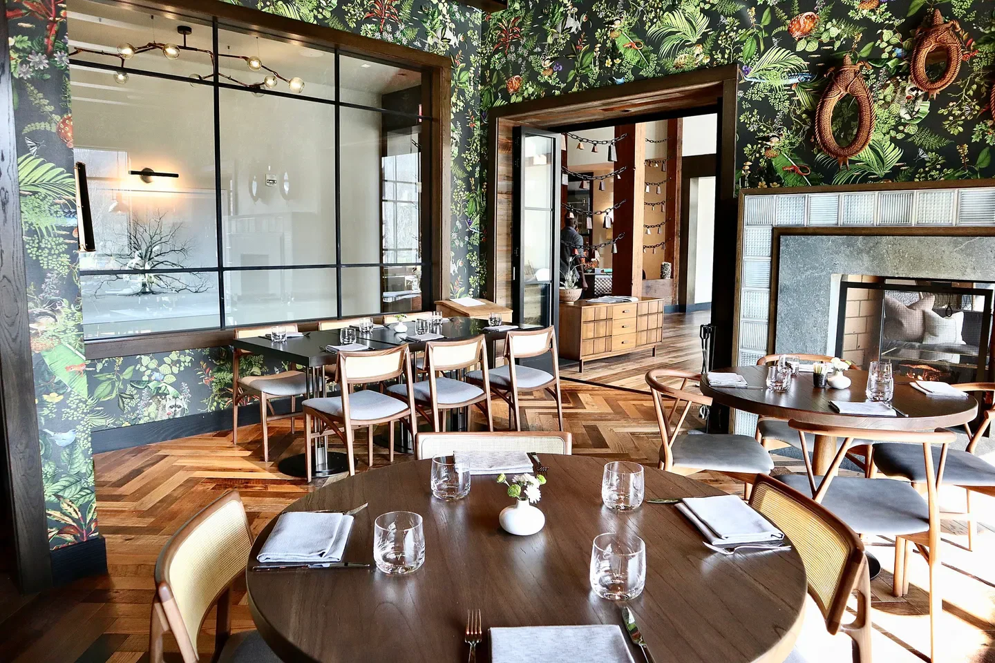 Interior of Sojourner restaurant in Nashville with stylish decor and dining tables