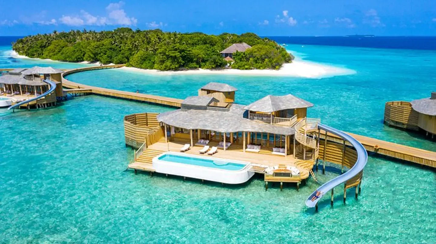 Luxury overwater villas with water slides at Soneva Fushi in the Maldives