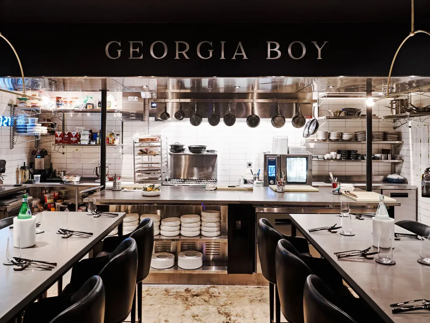Interior of Southern Belle | Georgia Boy in Atlanta, showing kitchen and seating areas.