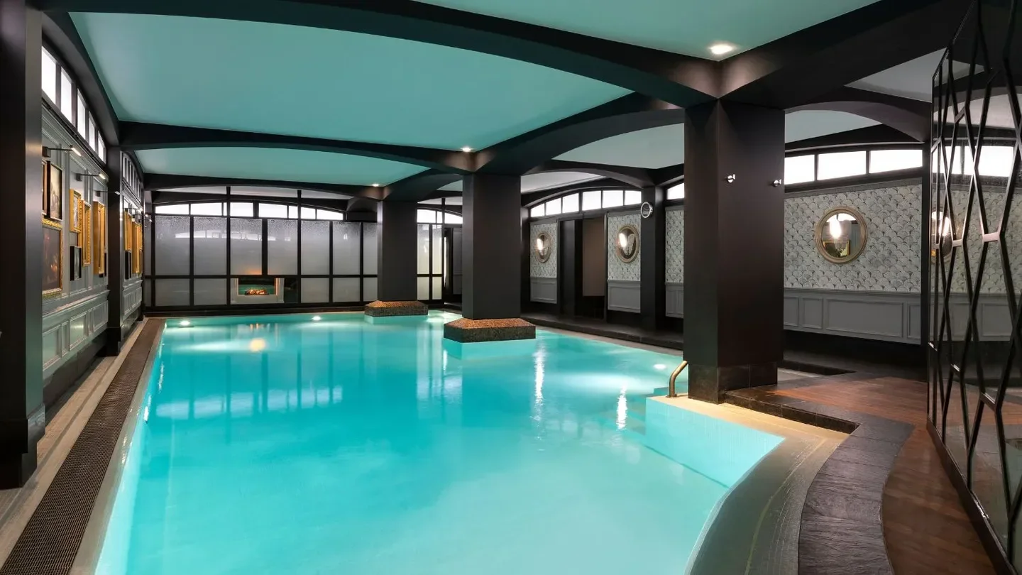 Indoor pool at Spa Diane Barrière Paris, a luxurious spa in Paris, France.